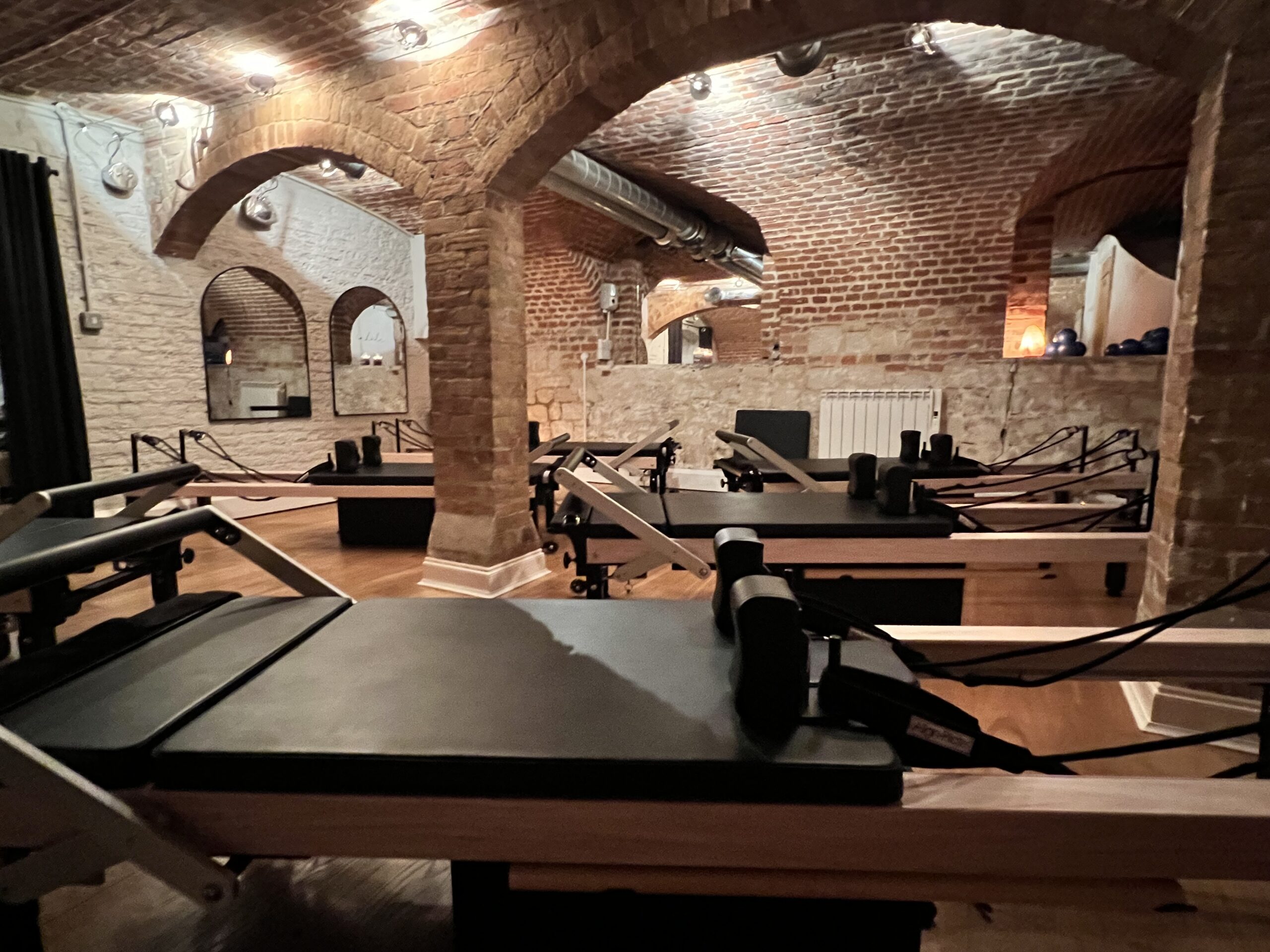 Interior of the pilates vault, showing Align Reformers